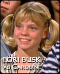 LORI BUSK 
as Caroline